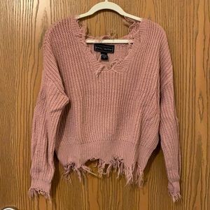 Pink distressed sweater